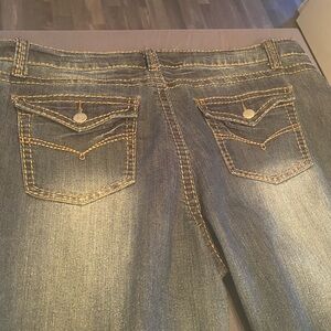 Plus size jeans with snap rear pockets distressed size 22 denim bootcut